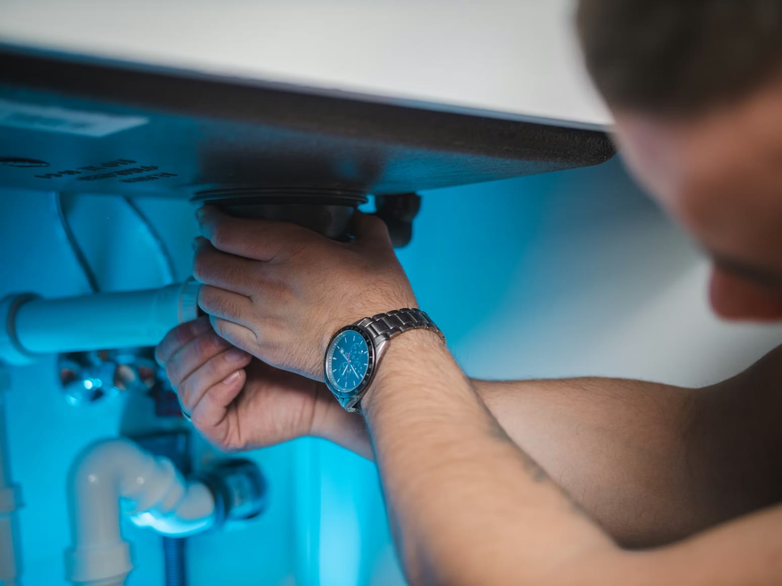 Before — Under-sink leak repair